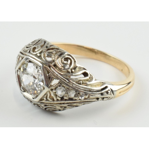 399 - Antique yellow metal (tests as 14ct) solitaire ring set with 0.75ct old cut diamond with filigree de... 