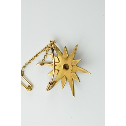 412 - 15ct gold star brooch set with seed pearls with safety chain, 5.0 grams.