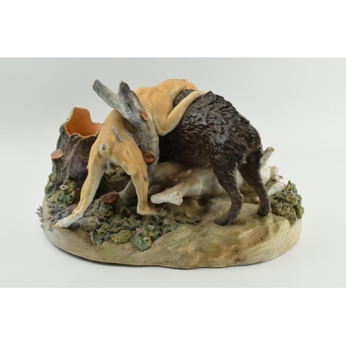 70 - Meissen: large 19th century pottery figural group of a wild boar being attacked by 2 wild dogs, in w... 