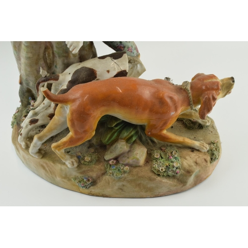 72 - Meissen: large 19th century Meissen figural group of a huntsman with 2 wild dogs, badly damaged, som... 