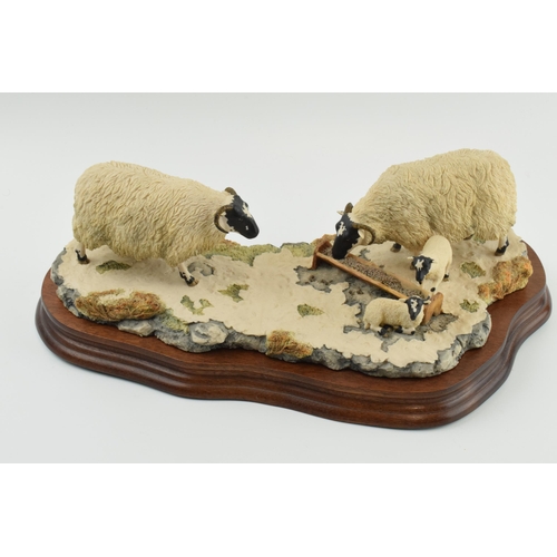 96 - Border Fine Arts figure group 'Early Lambs Late Snow' by Ray Ayres, 35cm long, wooden base.