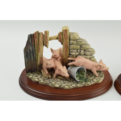 99 - Border Fine Arts figure group 'The Great Escape' and 'Mud Spa', both with pigs, wooden bases (2).