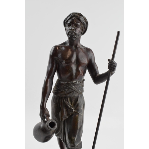 199 - After Marcel Debut: a French bronzed classical figure 'The Tunisian Trader', 32cm tall, 'Debut' sign... 