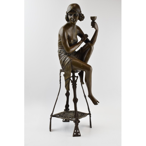 201 - After Auguste Moreau: a bronzed Art Nouveau figure of a Flapper Girl posed on a chair, 'A Moreau' to... 