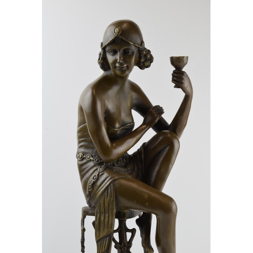 201 - After Auguste Moreau: a bronzed Art Nouveau figure of a Flapper Girl posed on a chair, 'A Moreau' to... 