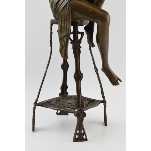 201 - After Auguste Moreau: a bronzed Art Nouveau figure of a Flapper Girl posed on a chair, 'A Moreau' to... 