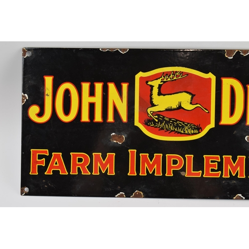 259 - Enamel Sign: John Deere Farm Implements, 45x21cm.