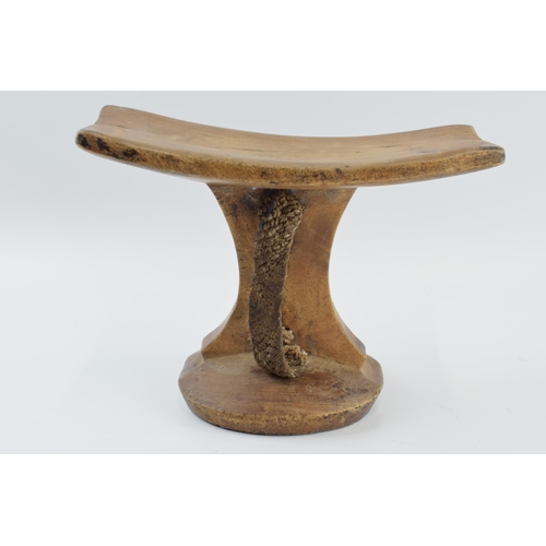 270 - African tribal headrest with rope / string handle, 24cm wide, 18cm tall.