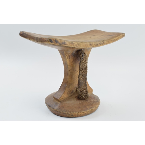 270 - African tribal headrest with rope / string handle, 24cm wide, 18cm tall.