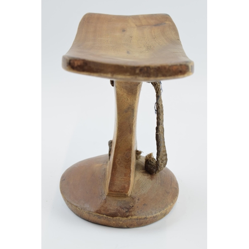 270 - African tribal headrest with rope / string handle, 24cm wide, 18cm tall.