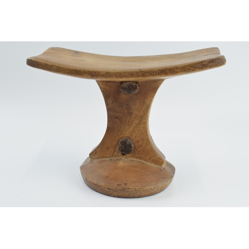 270 - African tribal headrest with rope / string handle, 24cm wide, 18cm tall.