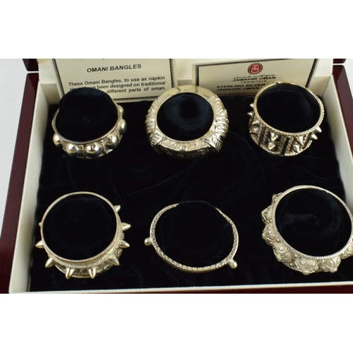 Jawahir Oman a set of 6 sterling silver napkin rings in the form of