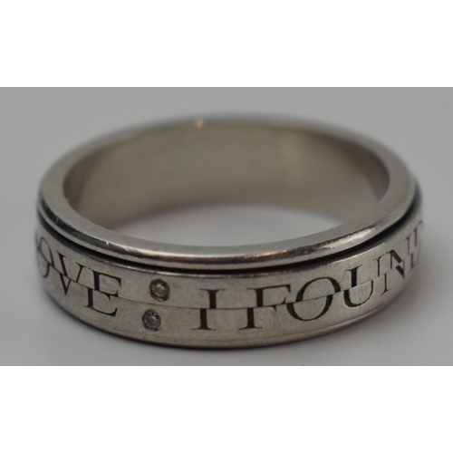 419 - Platinum 950 Brown and Newitt puzzle ring set with diamonds 'I Found Love', 8.2 grams, size M/N.