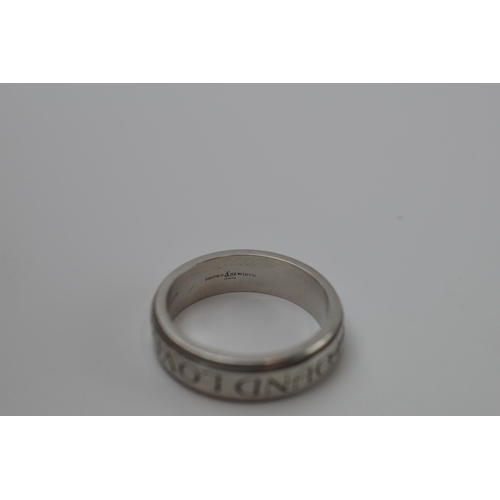 419 - Platinum 950 Brown and Newitt puzzle ring set with diamonds 'I Found Love', 8.2 grams, size M/N.