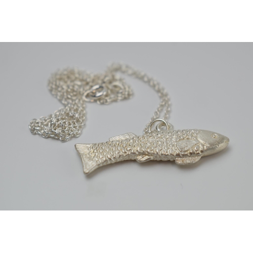 421 - Mappin and Webb silver fish pendant on silver chain, chain 45cm long.