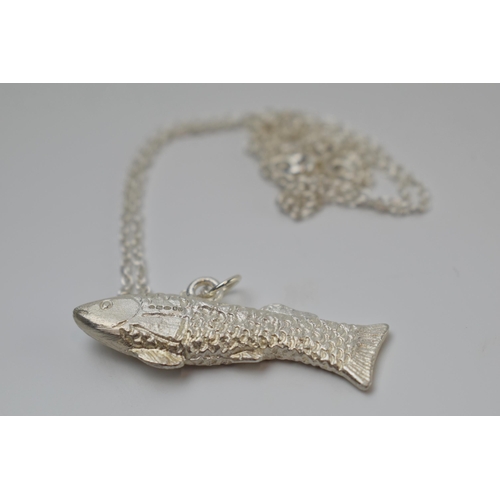 421 - Mappin and Webb silver fish pendant on silver chain, chain 45cm long.