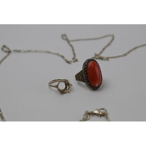 425 - A trio of silver jewellery to include a silver ring mount, a Chinese silver ring with red stone inse... 