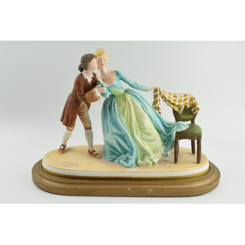 62 - Renaissance Prestige Ladies figure 'The Stolen Kiss', on wooden gilt base, 39cm long.