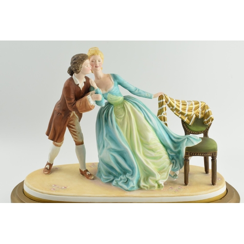 62 - Renaissance Prestige Ladies figure 'The Stolen Kiss', on wooden gilt base, 39cm long.