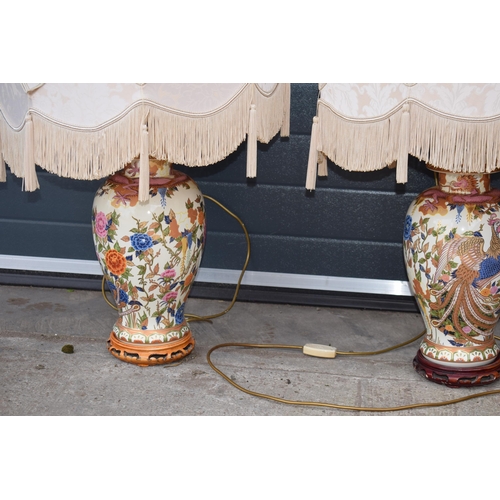 202E - A trio of modern oriental design ceramic lampbases with shades, 94cm tall inc fittings / shade (3).