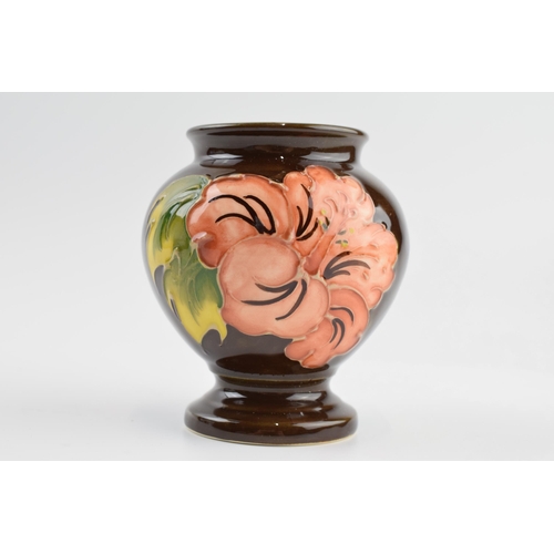 131A - Moorcroft Hibiscus vase on brown background, 9cm tall.