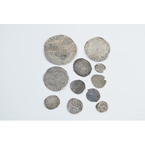 280A - An interesting collection of hammered silver coins of varying sizes and denominations to include Eli... 