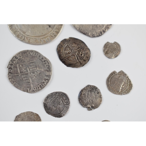 280A - An interesting collection of hammered silver coins of varying sizes and denominations to include Eli... 