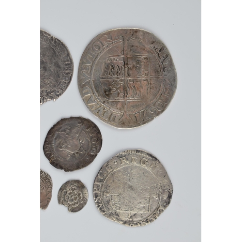 280A - An interesting collection of hammered silver coins of varying sizes and denominations to include Eli... 