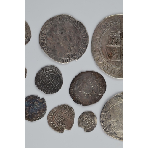 280A - An interesting collection of hammered silver coins of varying sizes and denominations to include Eli... 