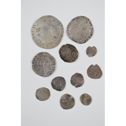 280A - An interesting collection of hammered silver coins of varying sizes and denominations to include Eli... 