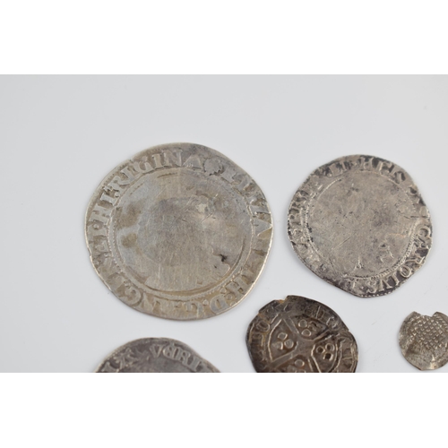 280A - An interesting collection of hammered silver coins of varying sizes and denominations to include Eli... 