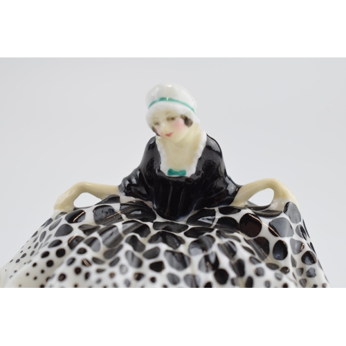 126A - Early Royal Doulton lady figure 'Polly Peachum', HN4, in spotted black and white dress, 8cm wide.