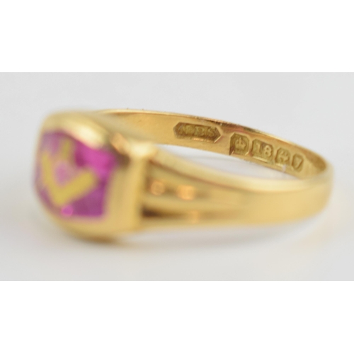 416B - 18ct gold ring set with a ruby with inlaid gold decoration with Masonic logo, 3.3 grams, size O/P.