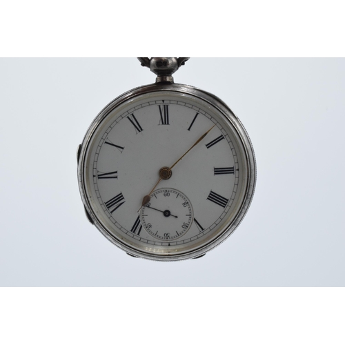 202 - Hallmarked silver open face pocket watch, winds, ticks, sets and runs, 45mm wide, with gold (coloure... 