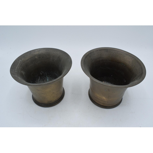 358 - A near pair of phosphor bronze mortars. Height 10cm.