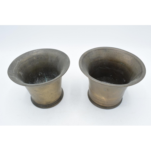 358 - A near pair of phosphor bronze mortars. Height 10cm.