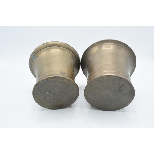 358 - A near pair of phosphor bronze mortars. Height 10cm.