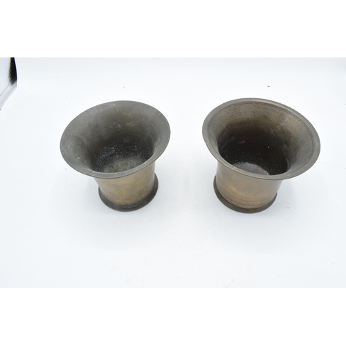 358 - A near pair of phosphor bronze mortars. Height 10cm.