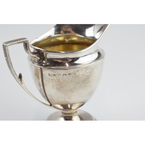 310L - Silver pedestal cream jug, Birmingham 1913, 87.4 grams, 10cm tall.