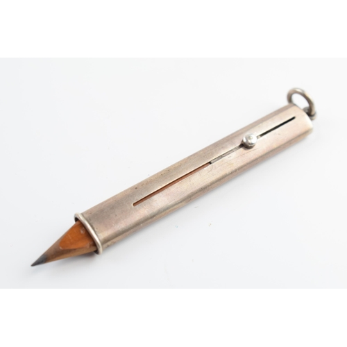 310N - Sterling Silver Samson Mordan pencil case with push action, 8cm long.