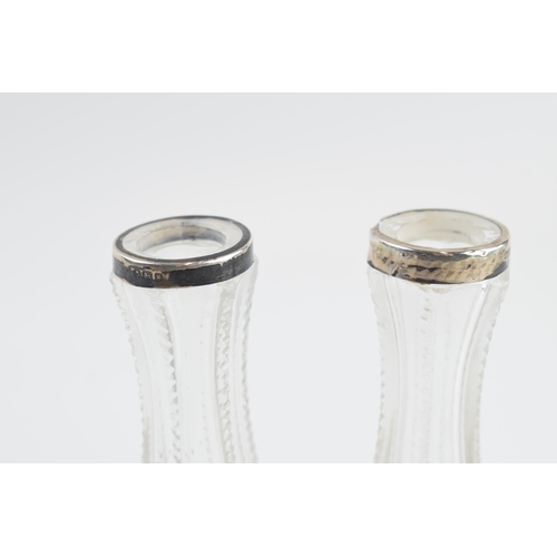 310P - Silver pair of glass vases with silver rims, Birmingham 1906 (2), 11cm tall.