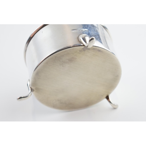 310S - Solid silver circular trinket box raised on 3 feet, with hinged lid and velvet interior, gross weigh... 