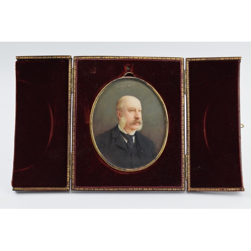 393A - Antique cased miniature portrait of a gentleman with sideburns, in leather easel-back case, lined wi... 