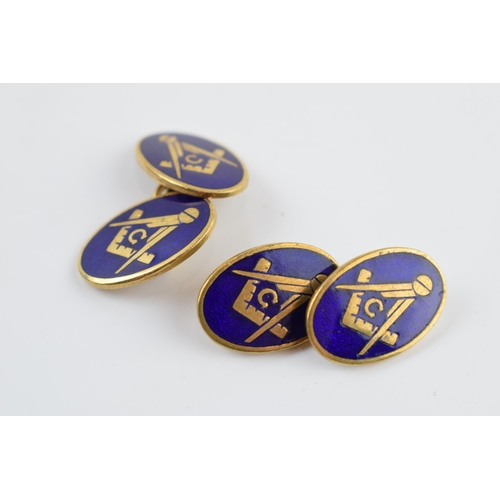 405J - A pair of Masonic gilt metal cufflinks with enamalled decoration (2).