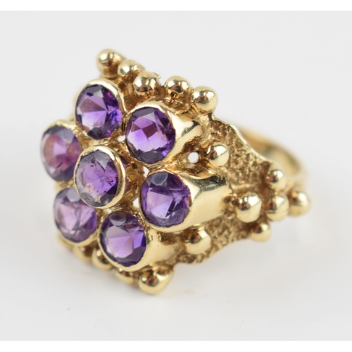 405L - 9ct gold ring set with amethyst stones, 5.0 grams, size O.