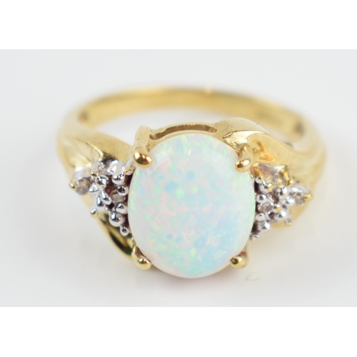 405P - 9ct gold opal and diamond set ring, 3.3 grams, size N/O.