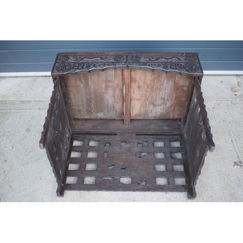 436 - Antique Chinese carved alter table with folding legs with carved figural decoration with character m... 