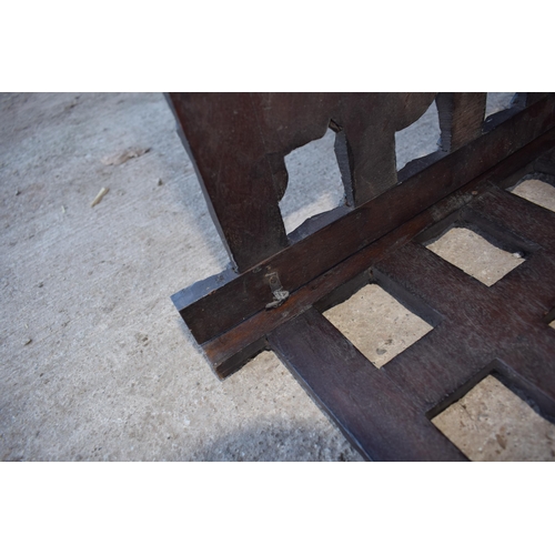 436 - Antique Chinese carved alter table with folding legs with carved figural decoration with character m... 