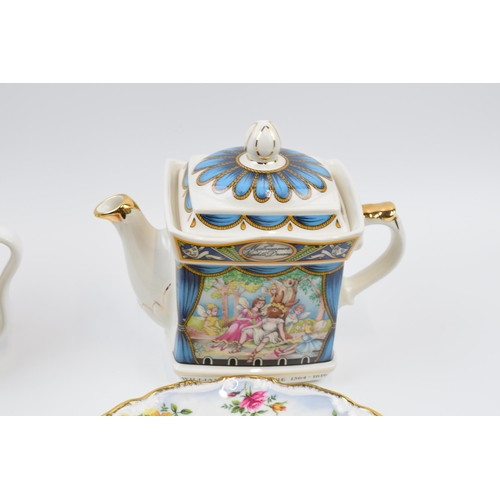 174 - Royal Albert Flower of the Month August trio, a Sadler teapot, a Royal Albert plate and a Wade teapo... 