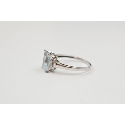 250 - 18ct white gold ring set with aqua marine stone, 2.1 grams, size N.